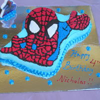 Spiderman Nicholas' 4th Birthday cake. Chocolate mud cake with buttercream icing.