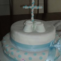 Boys Baptism this cake was covered in fondant and the cross is made of gum paste and edible pearls
