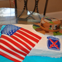 Patriotic Army Cake This is an army cake i made to go along with an army boot cake i did. Hat made from double layer 6in round cake pan. Camo is fondant and...