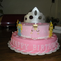 Princess Camila Yellow cake filled with cream and strawberries, princesses done with Cricut Cake machine (1st time used)