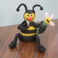 Loves Me Loves Me Not This is the first attempt at 3D figures...It is a little bee holding a daisy, pulling out petals, loves me, loves me not.