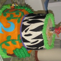 Go Diego Go! I wish buttercream photographed better - this cake looks so good in real life! I'm really happy with how it turned out :) The top tier...