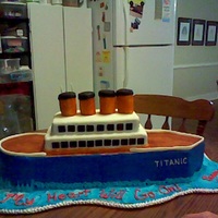 Cake For Prom The theme for prom this year is My Heart Will Go On ....sooooooo a titanic cake was ordered...this cake is 27 inches long, 8 inches wide...