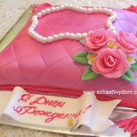 Pearl Necklace On A Pillow &Ntilde;hocolate cake with bc, covered with sugarpaste.