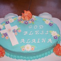 Confirmation Cake, June 2009 Vanilla cake frosted in buttercream. Gumpaste flowers including fantasy flowers and daisies, among others. The cross is also gumpaste.