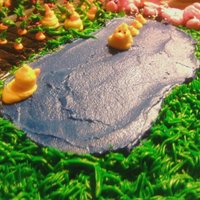 Ducks In A Pond This is a photo of some buttercream duckies in a buttercream pond!