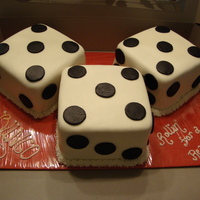 Bunco Dice Cake This was for a Bunco fundraiser. The cakes are 6" square and are covered with Fondant.
