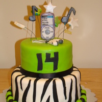 Zebra W/ Lime Green Customer wanted zebra print cake with lime green incorporated. All she said was she loves music so this is what I came up with. It was my...