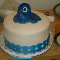 Bob The Blob Customer wanted Bob from Monsters vs. Aliens. I made it out of RKT and covered it in fondant then tinted some piping gel blue for ooze....