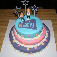 Icarly Cake iCarly Cake that I made for my daughter's 6th birthday. This cake was three layers that I covered with fondant. I got the color scheme...