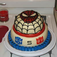 Transformers/spiderman Cake My first attempt at a tiered, fondant covered cake. This was made for my nephew for his 5th birthday. He requested a spiderman/tranformers...