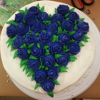 Wilton Class 1 Final I am so happy with this cake!! Please excuse the messy buttercream it was my first time trying the upside downicing method and it didnt...