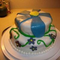 Flower Power Yellow cake cover with fondant flowers are gumpaste