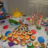 Hungry Caterpillar 1St Bday Cake!! The sun is a smash cake for the birthday boy and the rest is fondant! :) and there was a cupcake for everything the caterpillar ate in the...