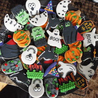 Halloween Cookie Assortment My assortment of Halloween cookies. They are covered in fondant and decorated in royal icing.