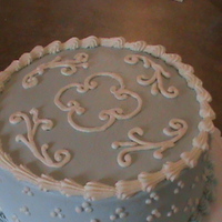 Blue And White white cake, filled with homemade lemon curd filling, iced with "buttercream dream" icing.