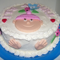 Its A Girl White chocolate mud cake with buttercream and touches of fondant