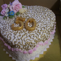 50Th Anniversary Cake vanilla cake with vanilla buttercream and covered in fondant and hand made flowers i am teaching myself to make them