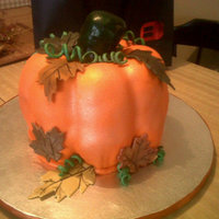 Pumpkin Bundt pumkpin cake. Top layer is carrot bottom is pumpkin. Iced and filled with cinnamon cream chz buttercream. stem is rkt. stem and...