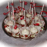 Christmas Cake Pops Pumpkin Spice Cake mixed with Caramel Penuche Icing, and dipped in White Chocolate.