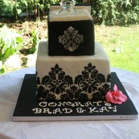 Engagment Cake This cake started to melt unfortunately when the pictures were taken. It was plus 35 degrees with humidity ontop of that, was hot!! Poor...