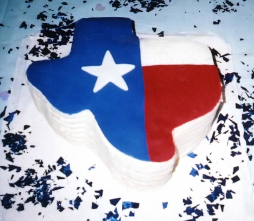 Texas_Cake.jpg my first grooms cake. can you teel were i'm from. it was a blast.(fondant on a red velvet cake)thanx 4 lookin