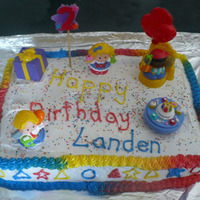 Little People Cake Red Blue and Yellow Little People Cake