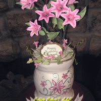 Vase Of Lillies This was a spur of the moment order so I only had a couple of days to make the flowers and plan this cake. The vase is all buttercream...