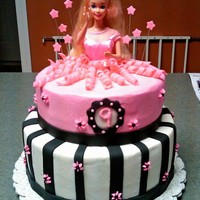 Barbie Cake Two tier birthday cake for little girl who loves Barbie.
