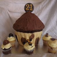 Giant Cupcake Ok, the design was to be based around leopard print, gold and glittery... the girl also loves her shows and handbags... I found the base SO...