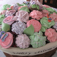 Butterflies & Flowers Buttercream flower cupcakes to match the color of the baby shower invitation. Fondant butterflies copied from the invitation as well. Plus...