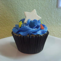 Stary Night Cupcake WHITE CAKE WITH CHOCOLATE FILLING WITH VANILLA BUTTERCREAM.