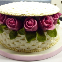 Wicker Basket Of Roses This was the cake design we made in the second evening class I attended. I used a dummy for this one. The roses are marzipan and this was...