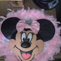 Minnie Mouse Cake & Cupcakes for a one year old's birthday, chocolate cake with strawberry jam filing, chocolate icing, covered in fondant . this was super tedious...