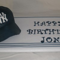 Yankees Hat Cake Key lime cake with raspberry filling for my boyfriend's birthday. Had some issues with the brim...