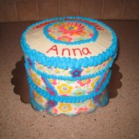 Birthday Cake Cake decorated with Duff's edible tattoos. Royal icing. Store bought guitars and stars. Fondant flower.