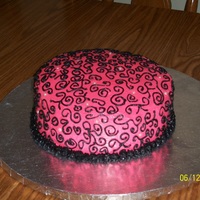 Pink Swirly Cake This was a cake I made for my sister's birthday. She loves pink and I love the way pink and black look together, so I deciede to do...