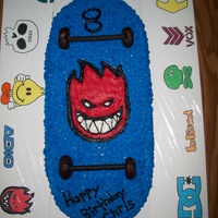 Skateboard Cake This is another skateboard cake I made for my friend's son. It is a 9x13 cake with one round cake cut in half, one half put on the...