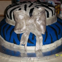 Bow Cake I made this for my friends 28th birthday. Her husband asked me to make her a cake and let me do it how I wanted. The bow is mmf (first time...