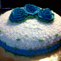Buttercream Cake FROM: PUERTO RICO RECIPE...my personal recipe.The flower are created in frosting too.