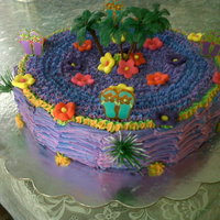 Tropical & Hawaii Cake Bride cake with buttercream frosting & foundant blossoms.