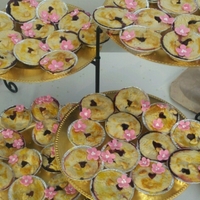 Wedding Pies! I made 300, 4 flavored, 3" pies. Key Lime, Strawberry Blueberry, Peach and Chocolate Mousse. 500 Fondant flowers. TFL