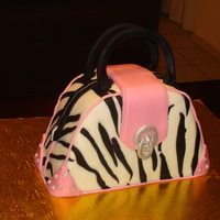 Zebra Print Purse Cake This is my first purse cake and the first cake I'm posting on Cake Central. I tried to include all of the details or a real purse:...