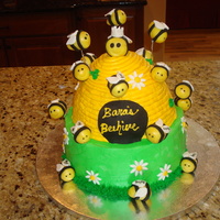 Beehive Cake End of the year party cake with a child's name on each bee.