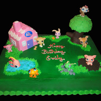 Littlest Pet-Shop Cake Chocolate cake covered with bettercreme, details are fondant and buttercream for the grass...
