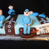 Luggage People Cake Chocolate slab cake made for 4 guys at Cambridge Toyota who were transferring back to the Woodstock plant. These guys work in the paint...