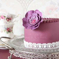 Eggplant-Elegance I made this for my friend who wanted a cake in eggplant and purple. I'm happy with the result :)