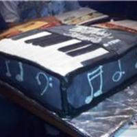 Piano Cake red velvet cake with cream cheese icing, covered in mmf.bday cake for music minister