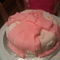 Ribbon Fondant First time using fondant, turned out pretty good. White cake butter cream icing