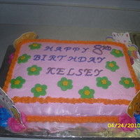 Lisa Frank Themed Cake This cake is done with all butter cream and has fondant and color flow icing accents.